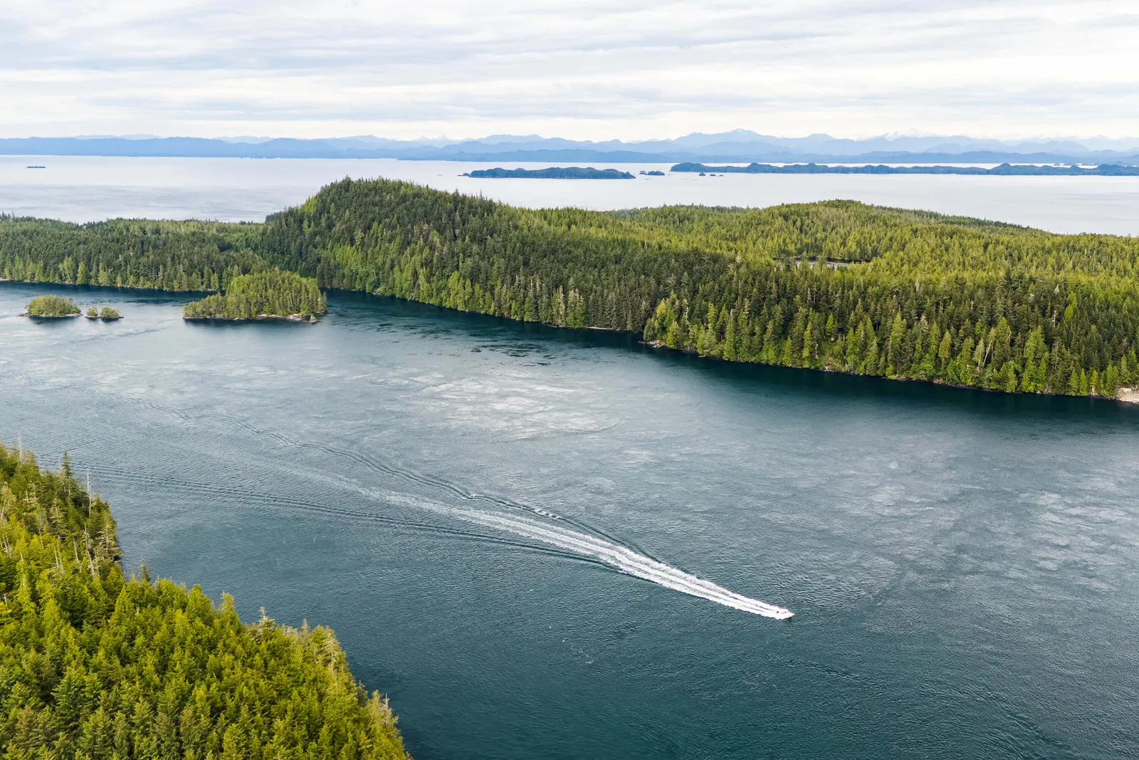 About Us Expeditions - Gods Pocket Drone with Boat